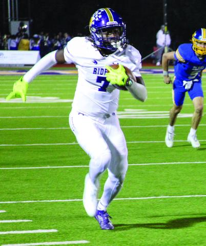 p Travis Belin charges down the sideline outpacing Brownsboro Bear defenders. (Leon Aldridge photo/The Light and Champion)