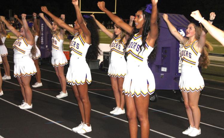 Center High School Roughrider Cheerleaders help keep fans in the game