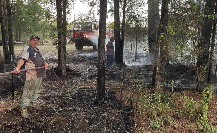 The Joaquin Volunteer Fire Department was called to extinguish three brush fires cause by burning trash between Oct. 15 and 21. (Courtesy photo by Joaquin Volunteer Fire Department)