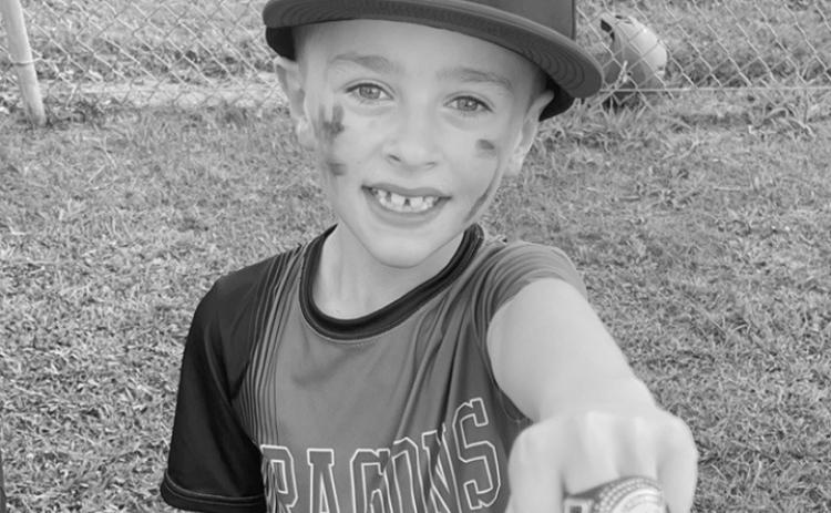 Racyn, Shelbyville 8u youth little league finishing up the season with some bling. Submitted Mommy Photo | Light and Champion Ed. Note: You can subit photos and we will print them for free.