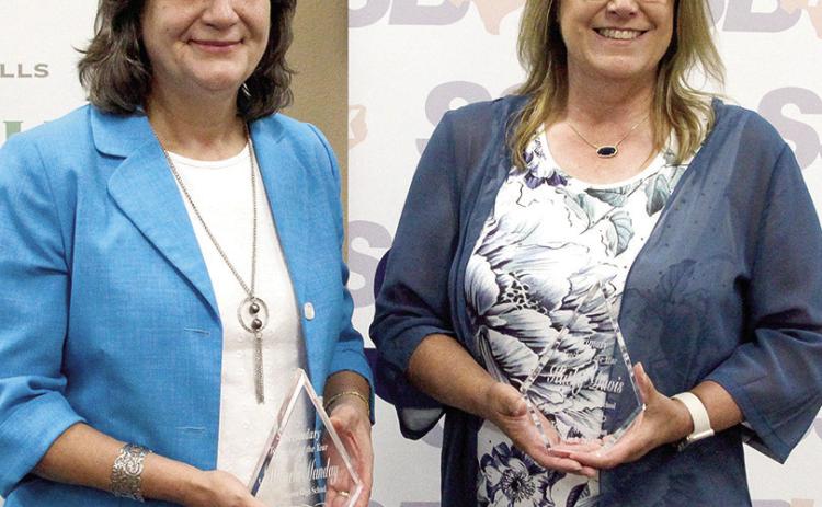 Named the Elementary Teacher of the Year was Kathy Davis (right) at F.L. Primary School in Center. The Secondary Teacher of the Year is Mihaela Munday at Timpson High School (left). Leon Aldridge | The Light and Champion