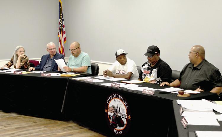 Jake Metcalf of RMG Contractors gives the Tenaha city council a presentation concerning his company’s street paving process. David Danley | Light and Champion